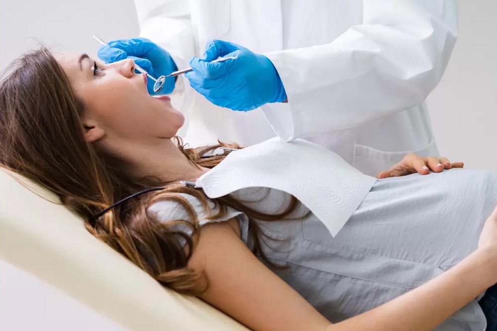 Лечение зубов во время беременности